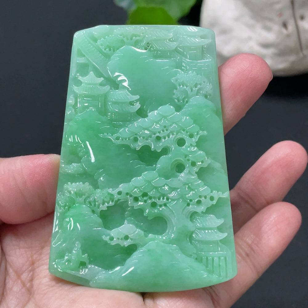 Huiliu Jadeite landscape pendant featuring intricate carved design, polished jade surface, and natural green hues.