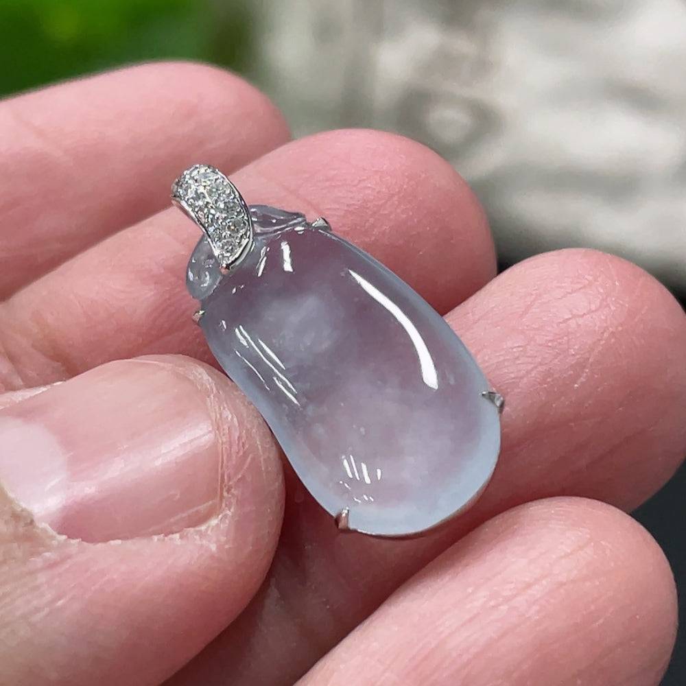 Jadeite auspicious gourd pendant with 18K gold setting and diamond accents, crafted by HUILIU HQ, on a white background.