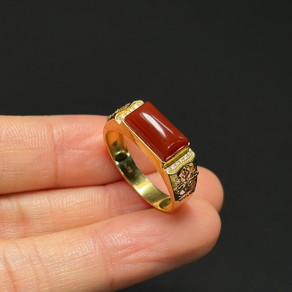 18K gold agate ring by HKHQ featuring a polished agate stone set in a sleek gold band.