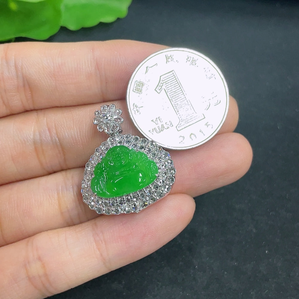 Elegant jadeite pendant with 18k gold and diamond accents, showcasing a smooth, polished jade stone with intricate detailing.