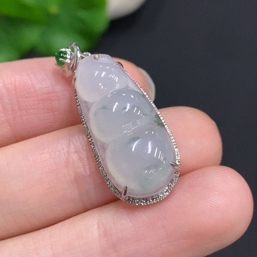 Jadeite lucky bean pendant with diamond accents, 18k gold, weighing approx. 3.63g, from HUILIU HQ featuring intricate jade craftsmanship.