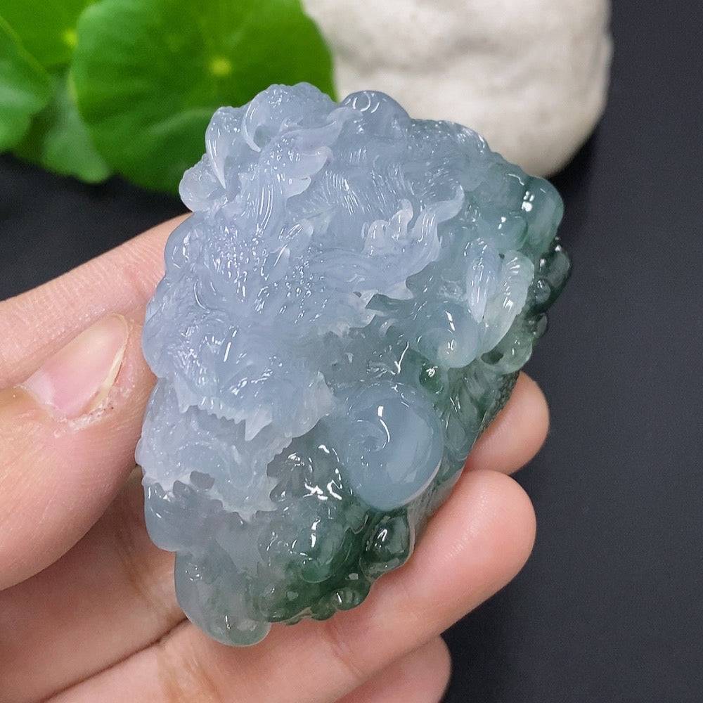 Jadeite pendant featuring a dragon plaque in green jade with intricate carved details, weighs approximately 67g, by HUILIU HQ.