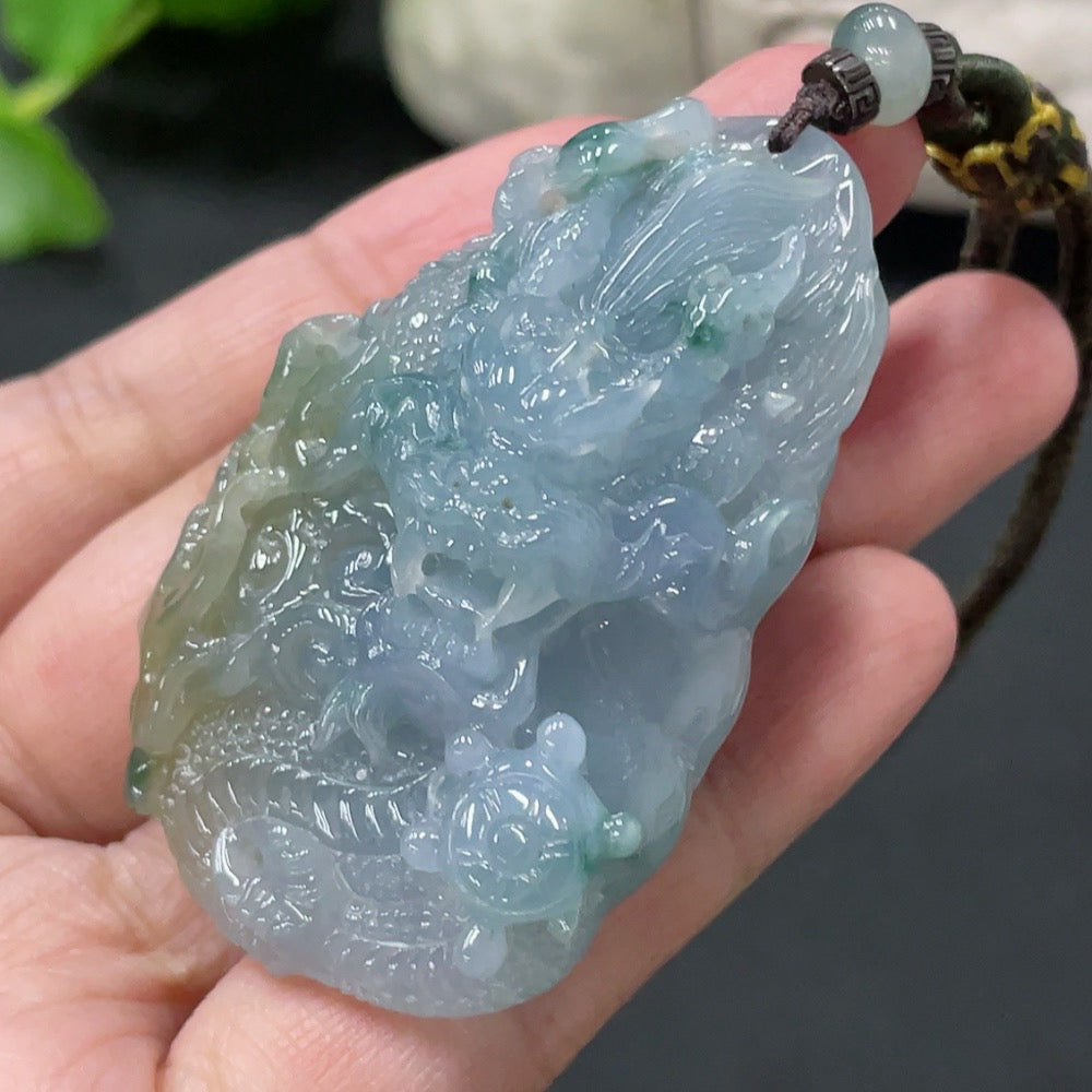 Jadeite Dragon Soaring pendant from HUILIU HQ, featuring a detailed carved jade dragon with rope, weighing approximately 46.3g.