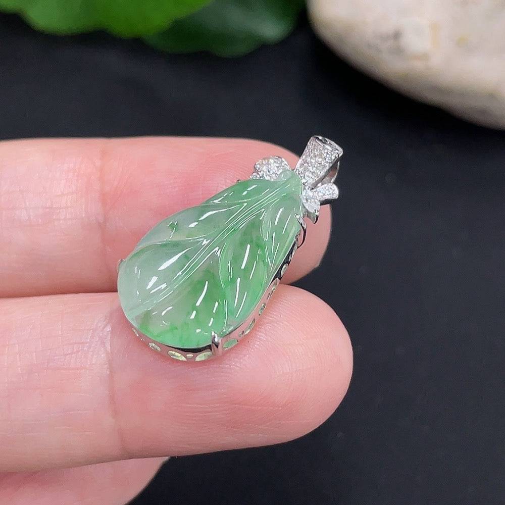 Large green jade stone from HUILIU HQ, showcasing smooth, polished surface and natural jade texture.