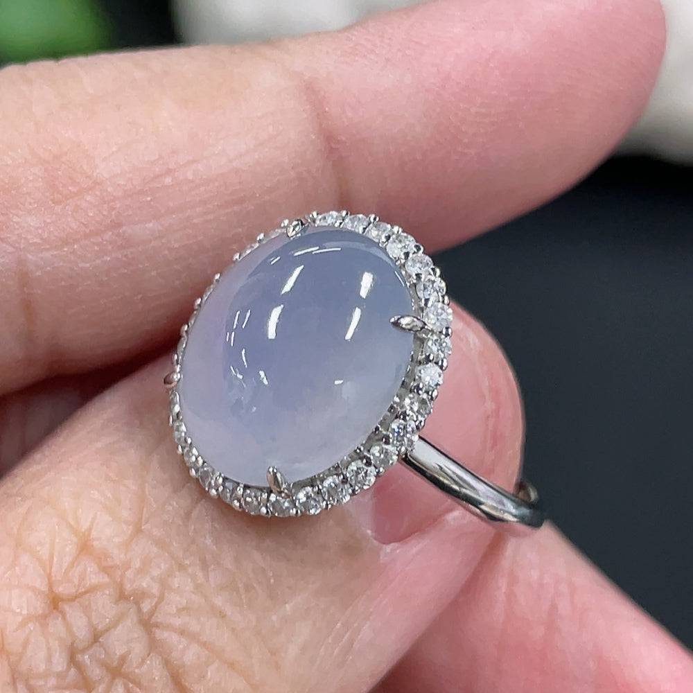 Jadeite cabochon ring with inlaid 18k gold and diamond accents, size 12.5, featuring a polished green jade stone and delicate gold details