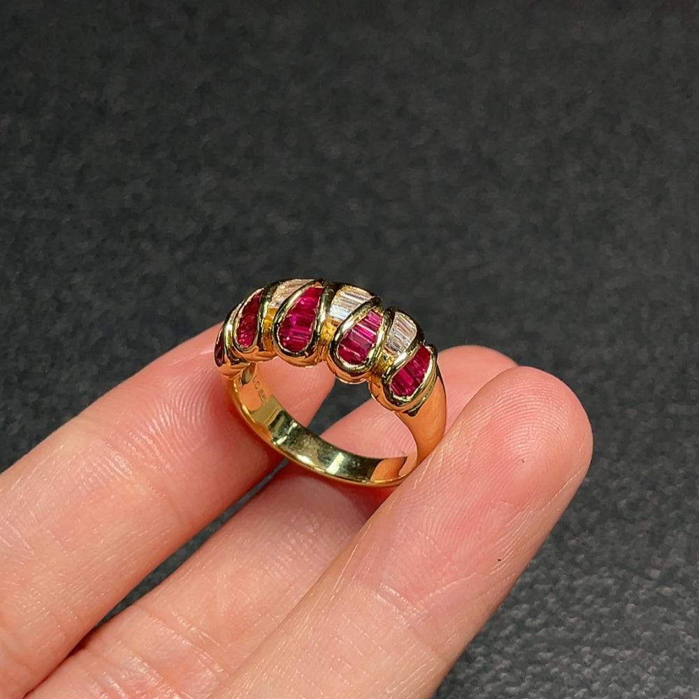 Huiliu Ruby ring featuring diamond accents, crafted with gemstones, showcasing a vibrant red ruby set in a stylish band.
