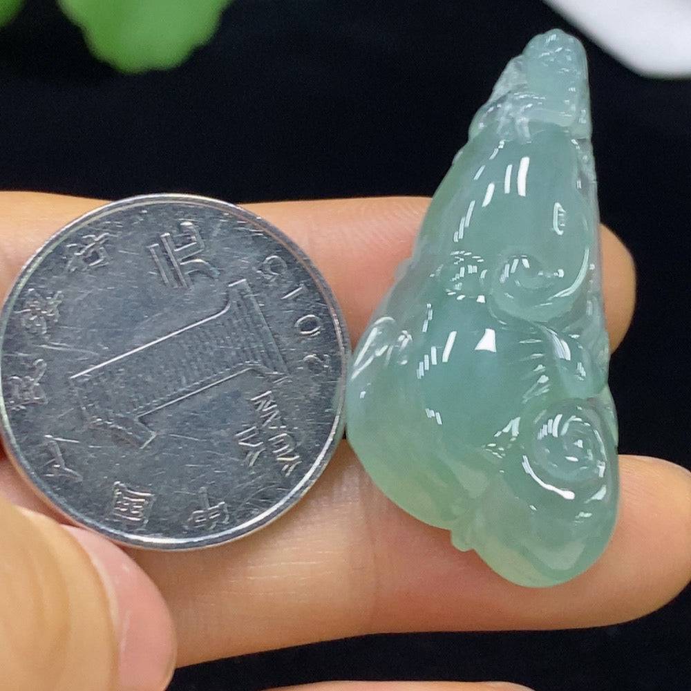 Huiliu Jadeite Ruyi pendant with intricate carvings, featuring a smooth polished surface and traditional Chinese design.