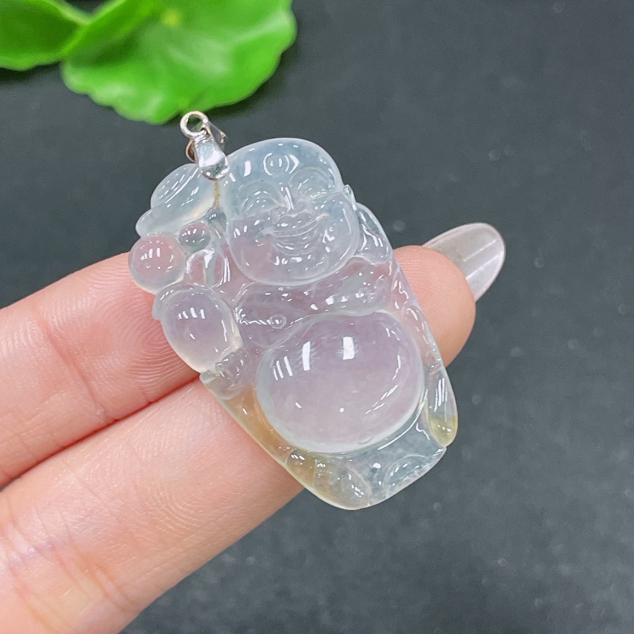 Jadeite Buddha pendant with 18k bezel, crafted from green jade, weighing approximately 8.08 grams, by HUILIU HQ.