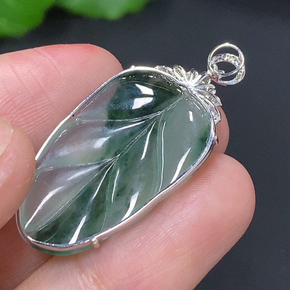 Huiliu Jadeite leaf inlay pendant with diamond accents, showcasing intricate jade craftsmanship and elegant design.