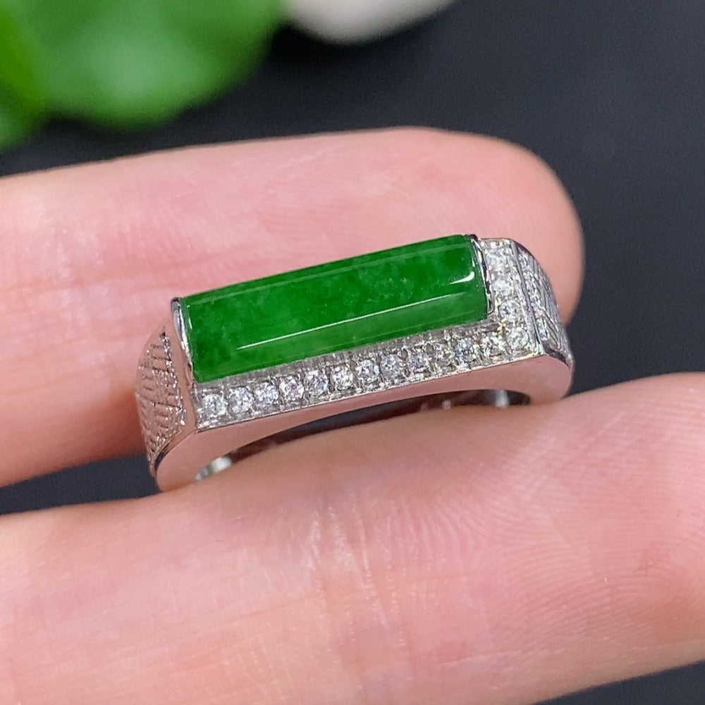 14K gold ring featuring a polished jadeite cabochon with diamond accents, designed by HKHQ.