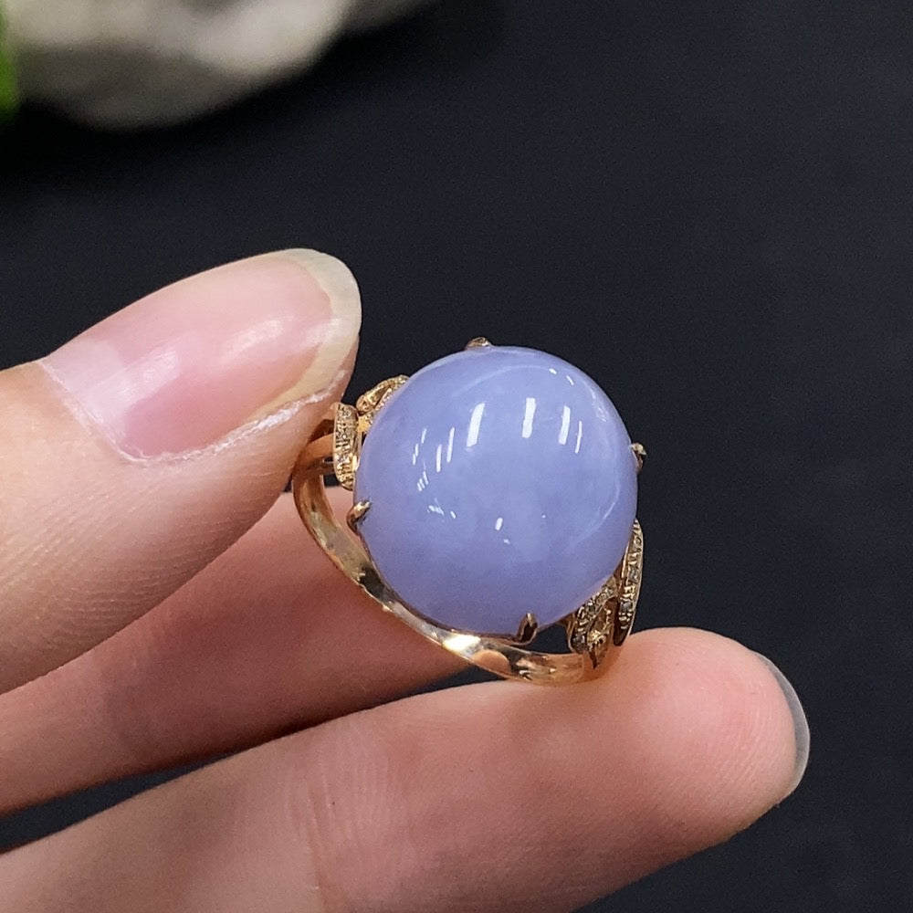 HUILIU HQ jadeite cabochon ring with diamond accents, featuring a polished jade gemstone and intricate silver setting.