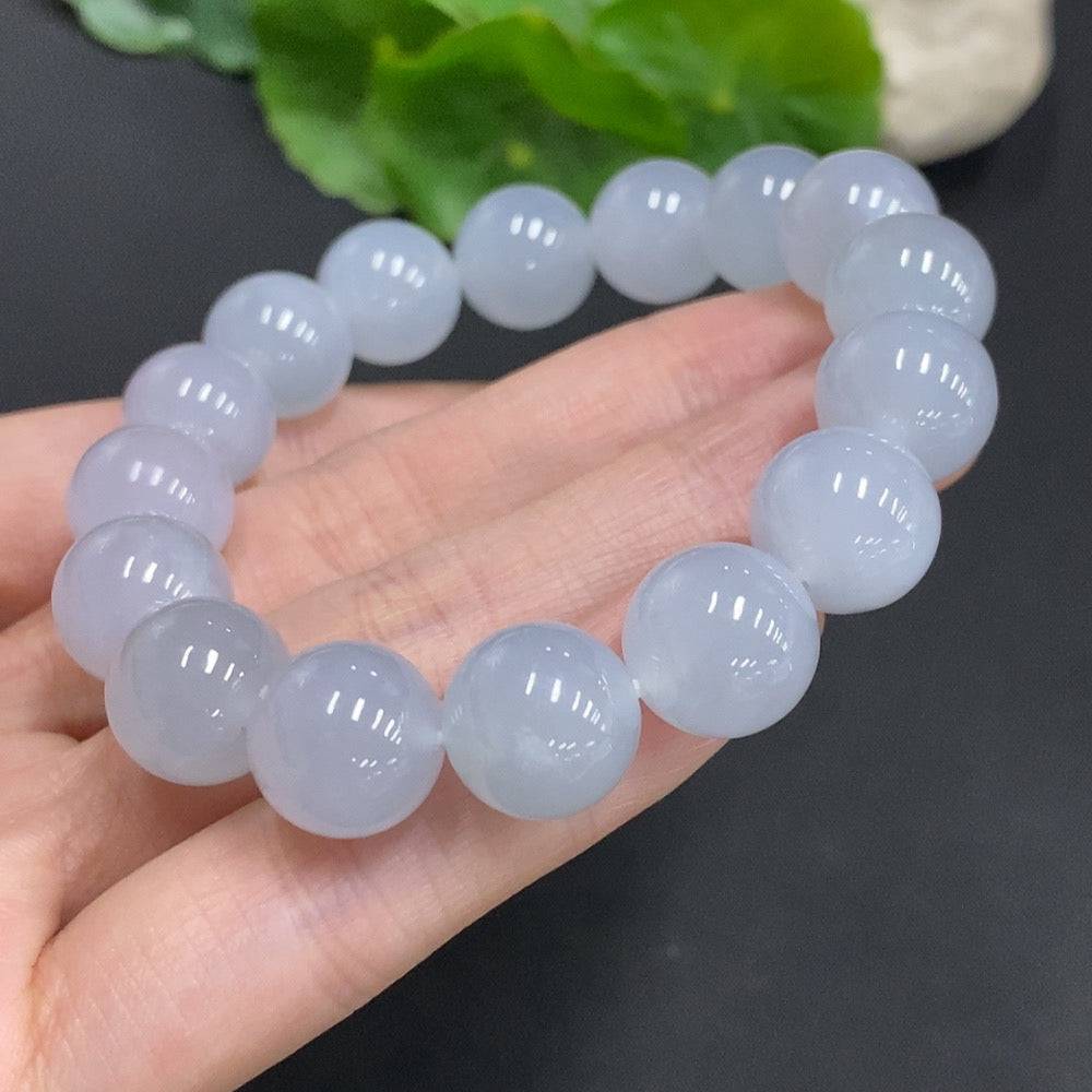 HUILIU HQ jadeite bracelet with 12mm beads, approx. 50.3g weight, showcasing smooth, polished green jade stones.
