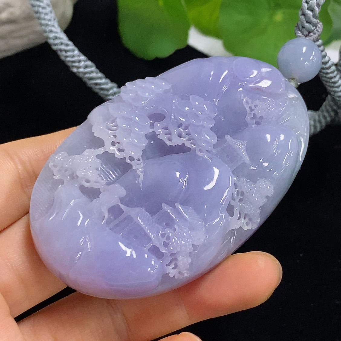 Jadeite pendant featuring a landscape design with a rope chain, weighing approximately 110.3g, crafted by HKHQ.