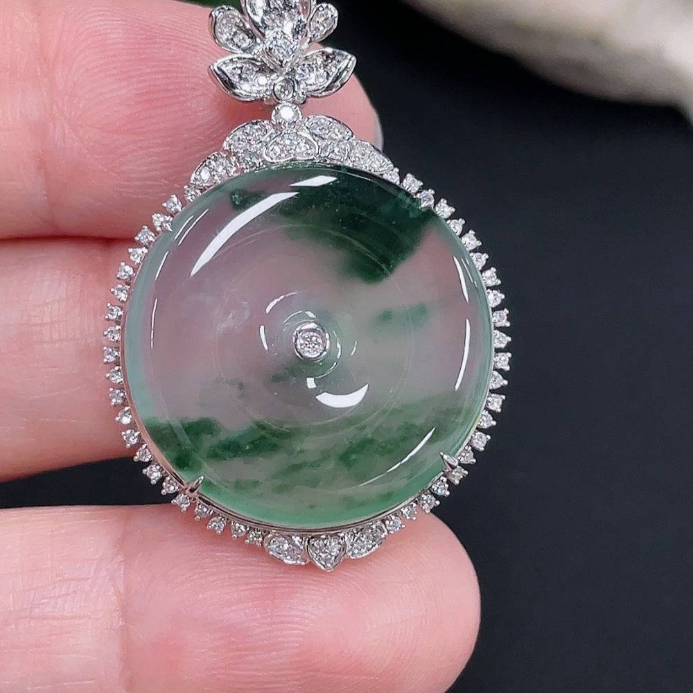 Jadeite peace knot pendant with 18K gold accents and diamond details, crafted by HUILIU HQ, featuring a smooth jade surface.