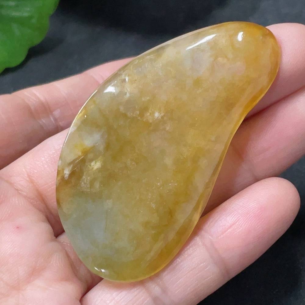 Huiliu Jadeite pendant featuring a detailed abundance motif, crafted from high-quality jade, symbolizing prosperity and good fortune.