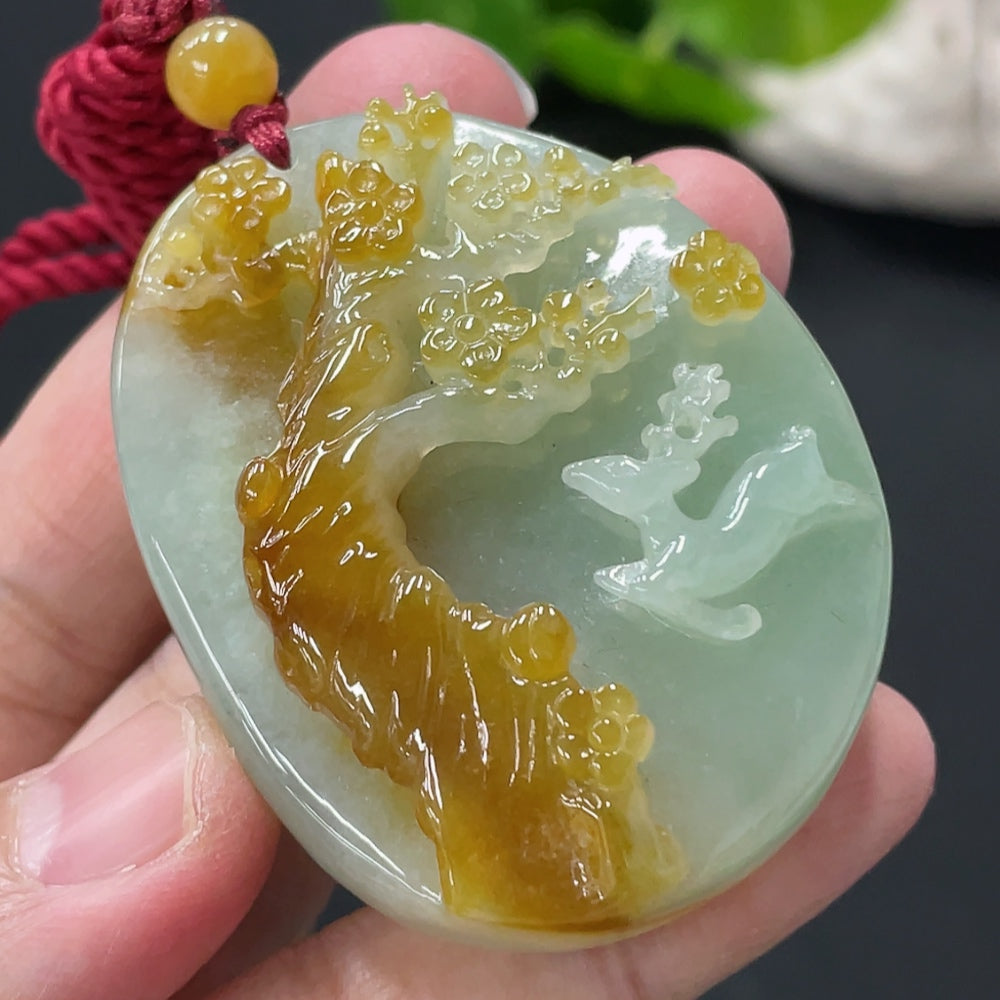 Huiliu Jadeite deer pendant featuring a smooth, polished jade deer carved from green jade, hanging on a delicate cord.