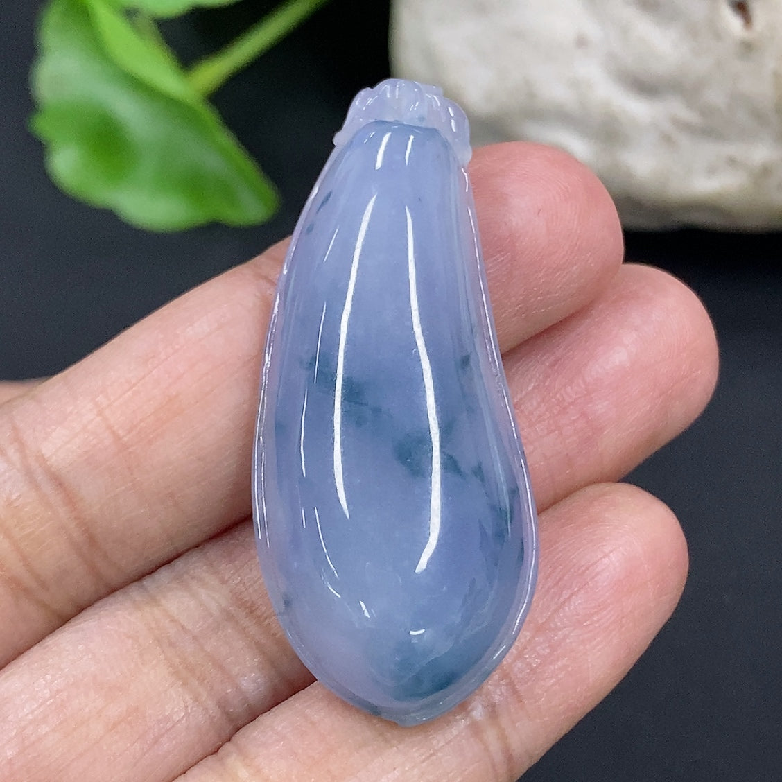 Jadeite auspicious gourd pendant from HKHQ, intricately carved, weighing approximately 10.4 grams, showcasing rich green jade color.