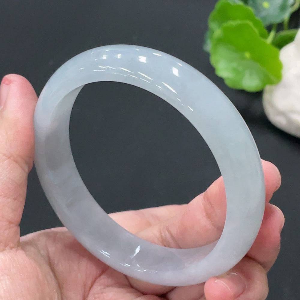 HUILIU HQ jadeite round bangle weighing 56g, size 57.9mm, featuring smooth polished jade surface with natural green hue.