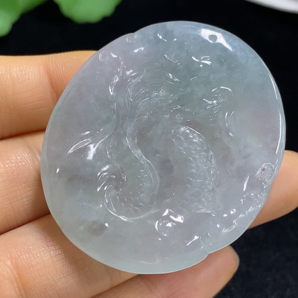 Jadeite pendant featuring a dragon design, weighing approximately 33.56g, crafted by HUILIU HQ in vibrant green jade.