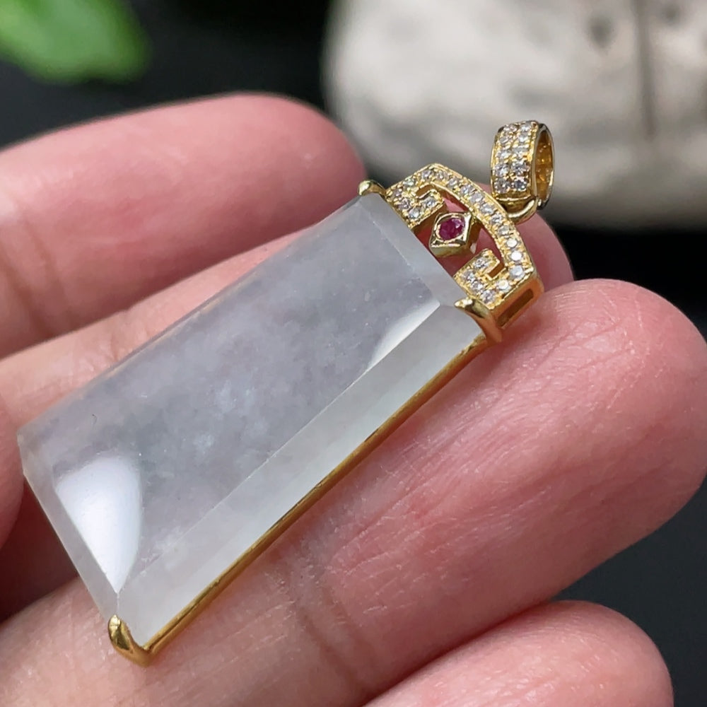 Huiliu Jadeite plain pendant in a metal setting, showcasing smooth, polished green jade with a simple, elegant design.