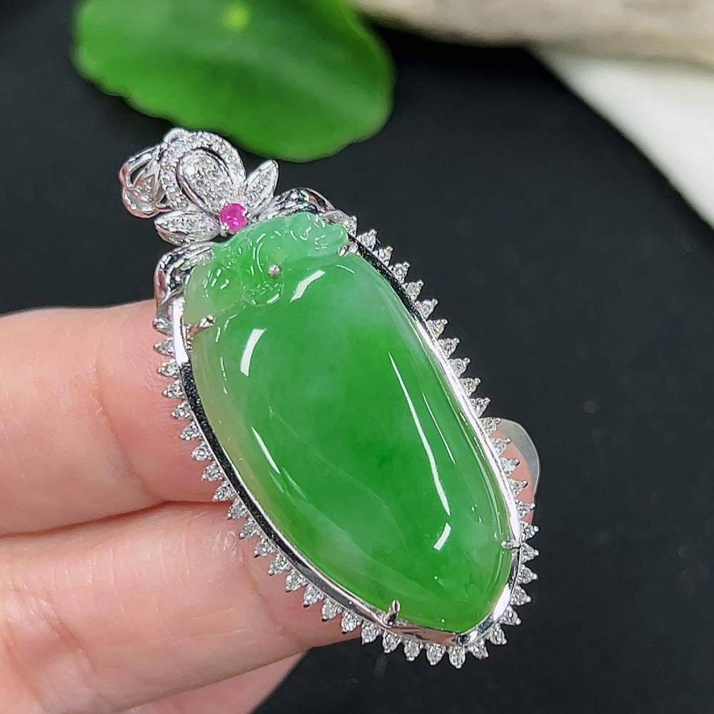 Jadeite Fortune Melon pendant in 18K gold with diamond accents, hanging on a delicate necklace chain.