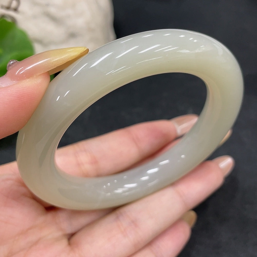 HKHQ Hetian Jade round bangle, size 54.7, weighing 66.8g, showcasing smooth, polished green jade bracelet design.