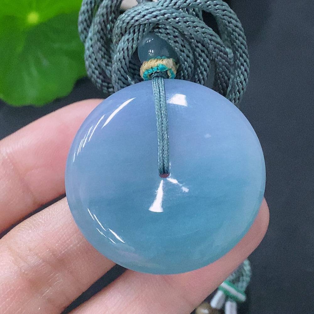 HUILIU HQ jadeite pendant with peace knot design, approximately 15.2g including rope, showcasing smooth green jade stone.