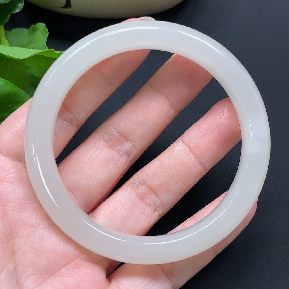 HKHQ Hetian Jade round bracelet, 59.2mm diameter, approx. 50.77g, showcasing smooth jade beads and elegant craftsmanship.
