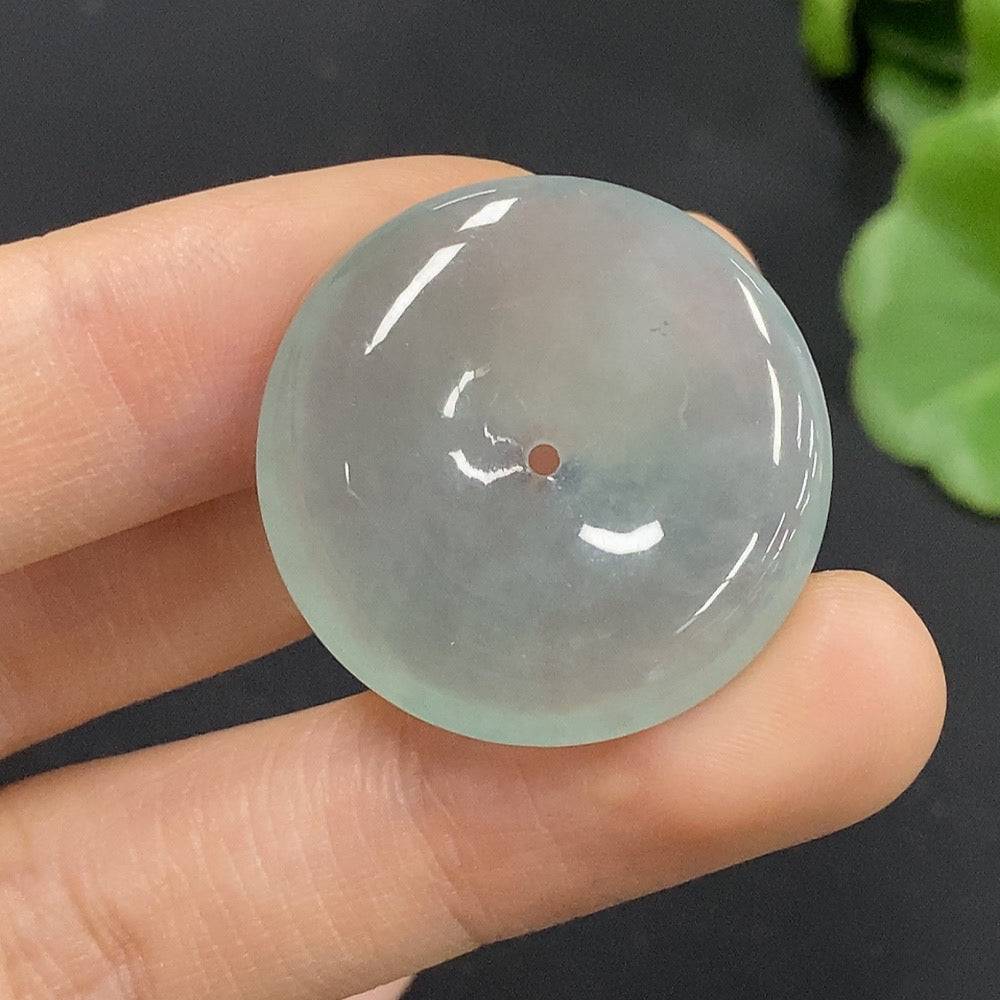 Huiliu Jadeite Safety Buckle Pendant featuring polished green jadeite stone with carved design, certified by Huiliu HQ.