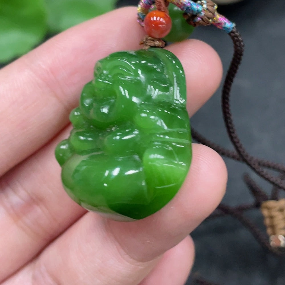 Huiliu Hetian jade Buddha pendant with rope, featuring smooth carved jade and traditional design, certified by Huiliu HQ.