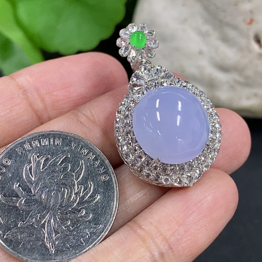 Jadeite cabochon pendant with 18K gold setting and diamond accents, elegant necklace by HKHQ, showcasing the gemstone's smooth surface.