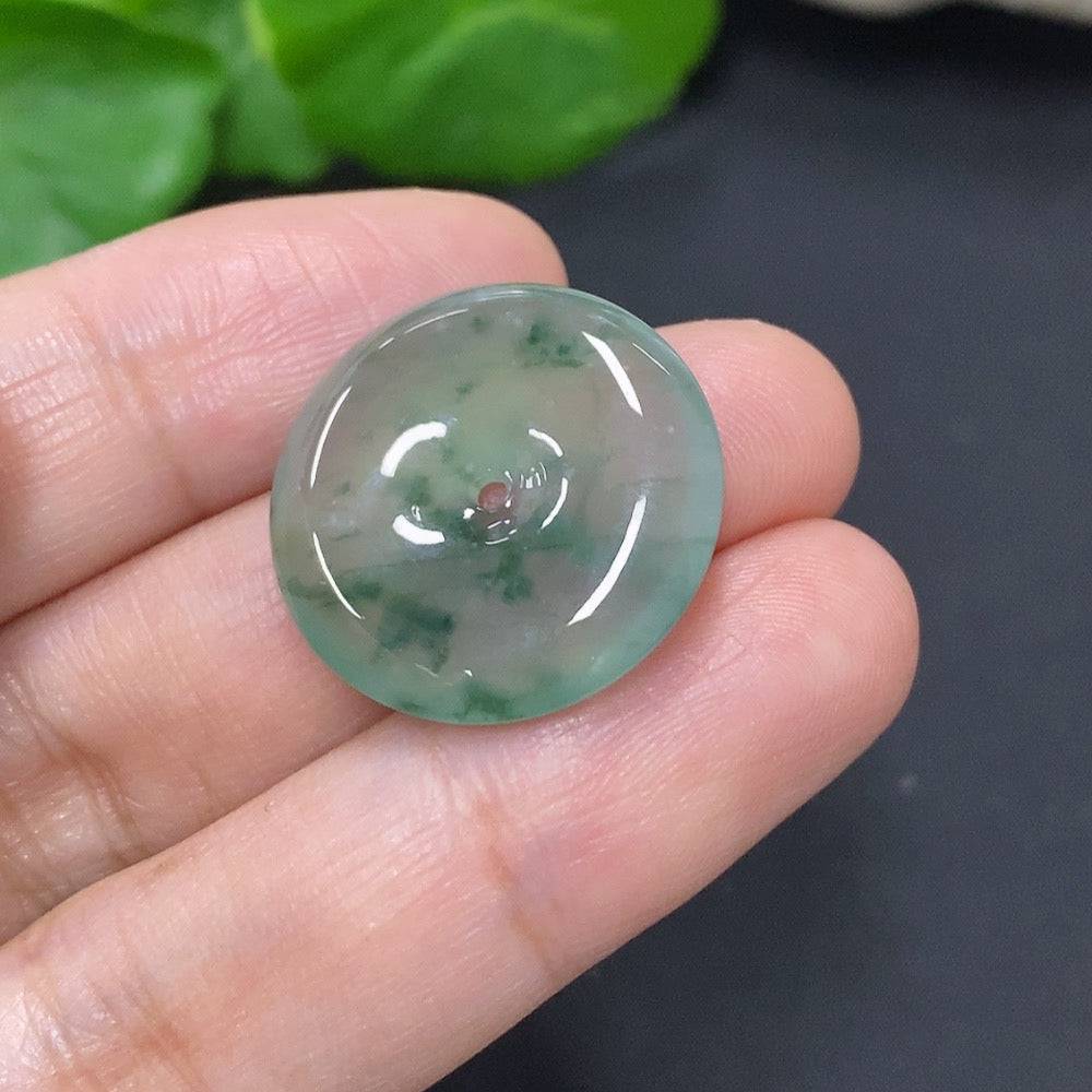 Jadeite Peace Knot pendant from HUILIU HQ, crafted in jade, weighing approximately 4.2g, with intricate knot design.