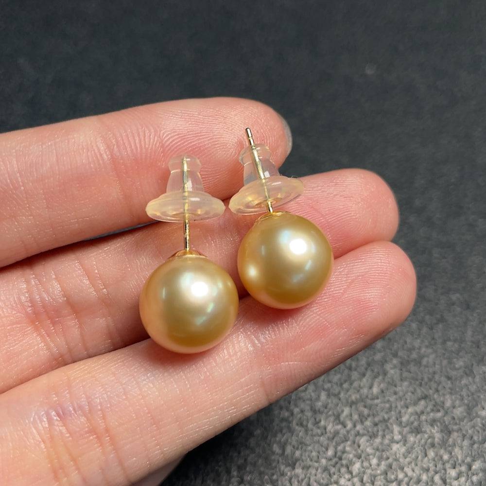 Huiliu certified seawater pearl earrings with 11.2mm round pearls in natural color, elegant jewelry for pierced ears.