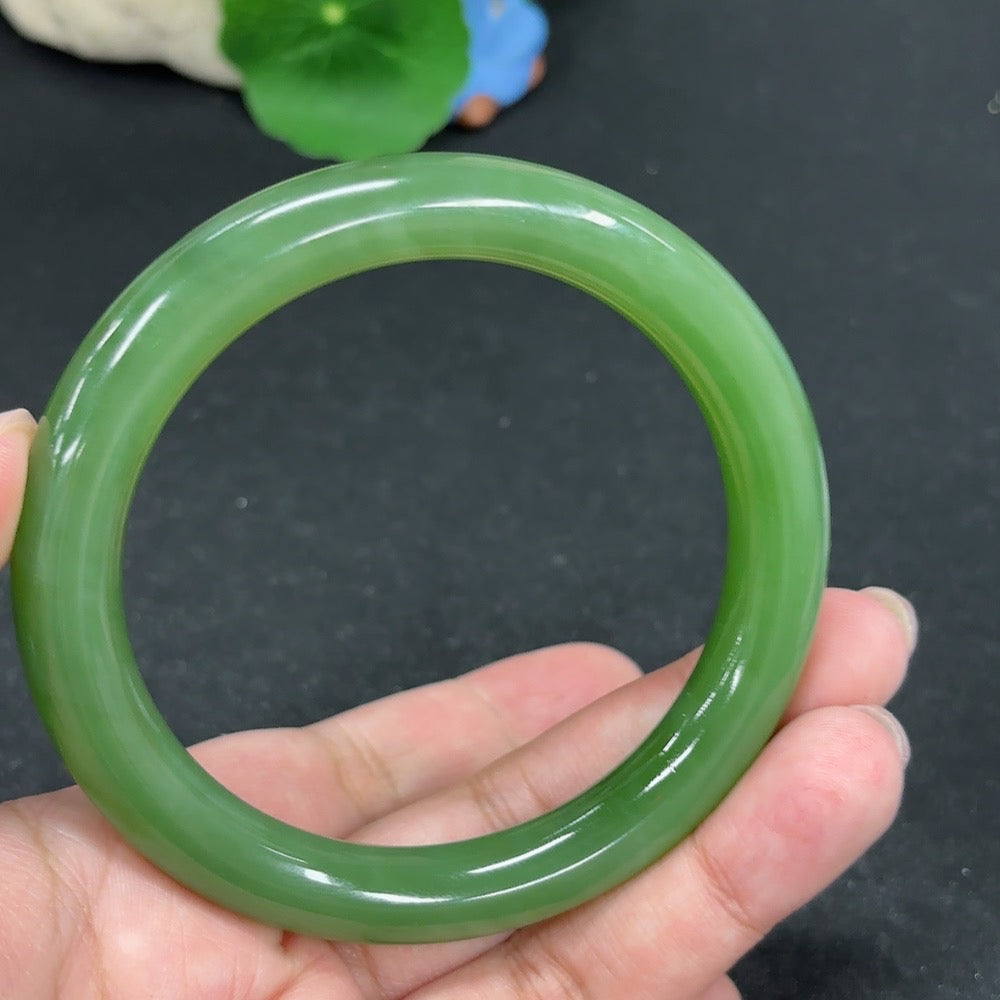 HKHQ Hetian Jade round bangle bracelet, size 60, 53.1g, featuring smooth jade surface and elegant craftsmanship.