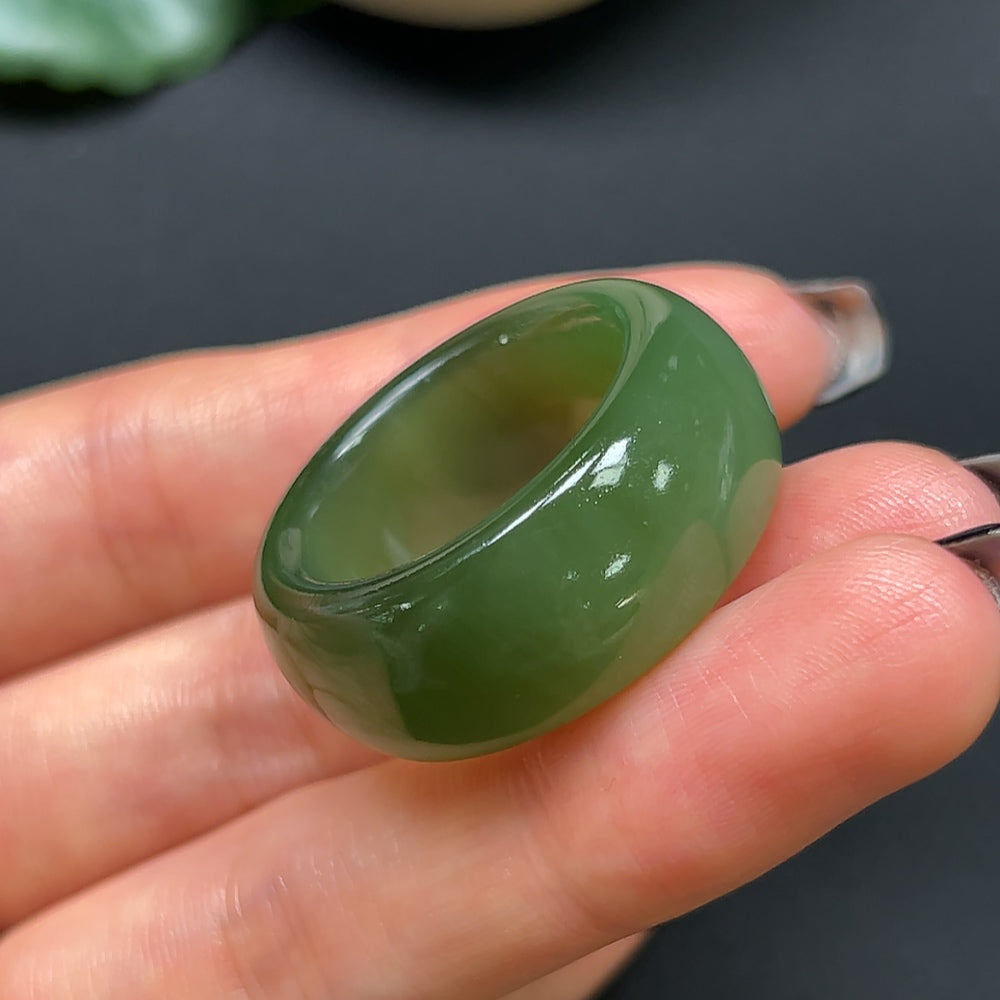 Hetian Jade thimble jewelry by HKHQ, size 24, weighing approximately 14.37g, featuring smooth green jade craftsmanship.
