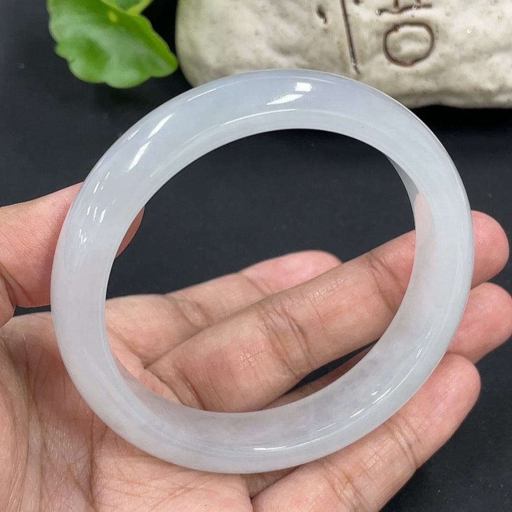 HKHQ jadeite round bangle with 57.5mm diameter, approximately 58g, featuring smooth, polished jadeite surface and rounded design.