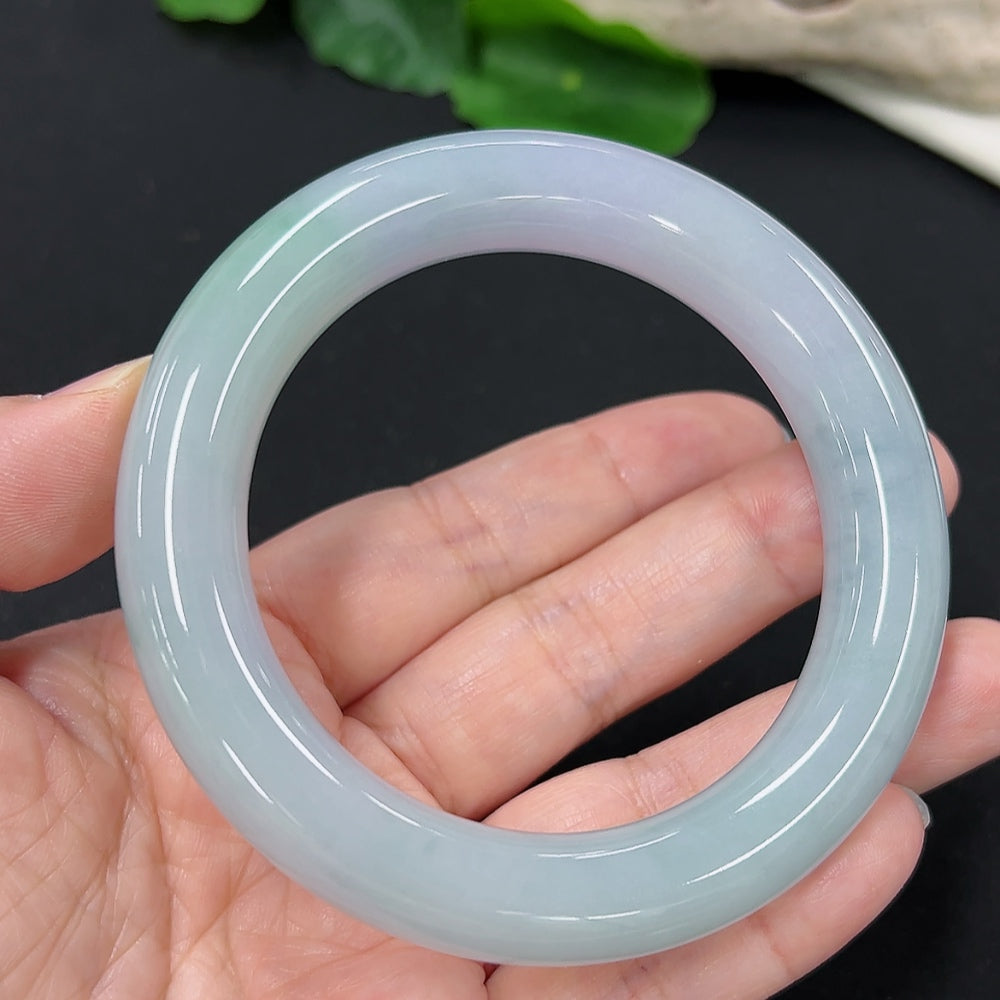 HKHQ jadeite round bangle, size 55.2, showcasing smooth, polished green jadeite bracelet with a glossy finish.