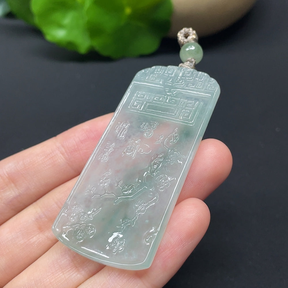 Jadeite Three Friends of Winter plaque with cord, featuring detailed carved figures in green jade, weighing approx. 17.89g.