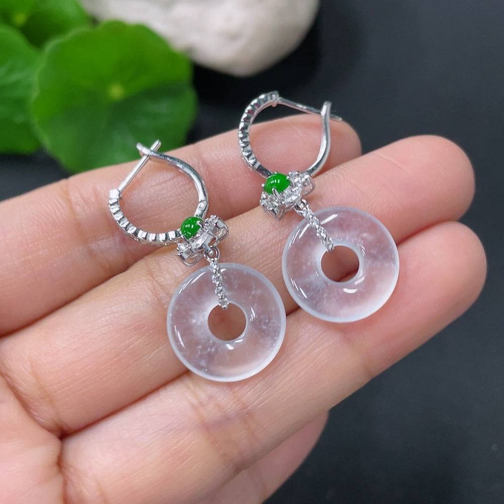 HUILIU HQ jadeite earrings set in 18k gold with diamond accents, showcasing elegant green jade jewelry with sparkling details.