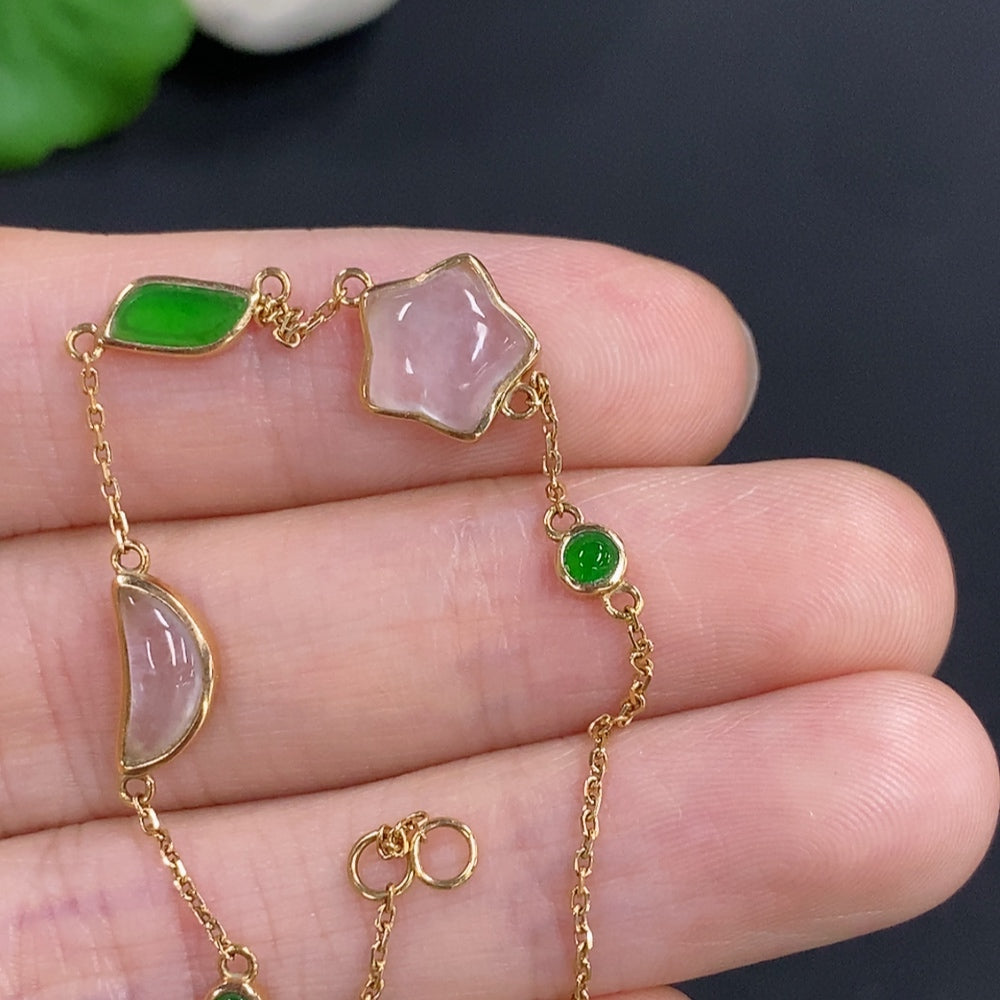 Green jadeite bracelet with 18k gold inlay and non-A grade stones, featuring delicate jade jewelry design.