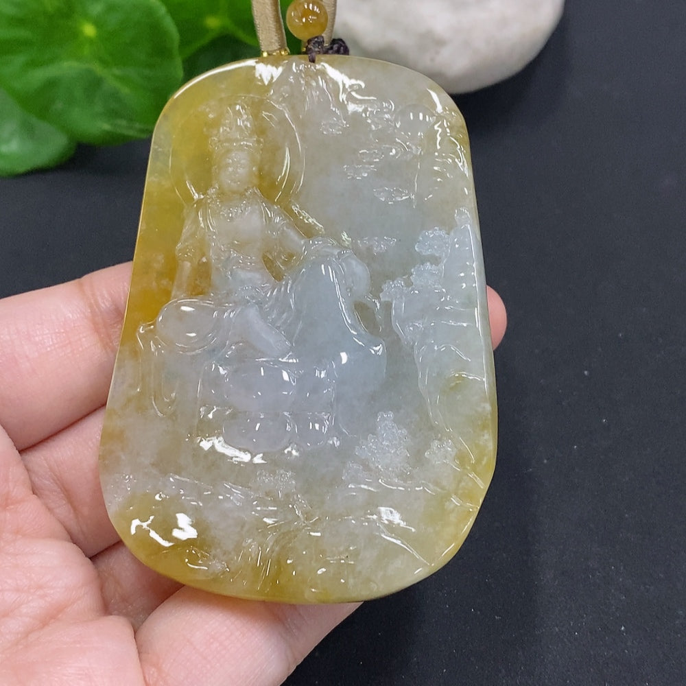 Jadeite Guanyin pendant with landscape design on jade, weighing approximately 84.3g, shown with its rope.