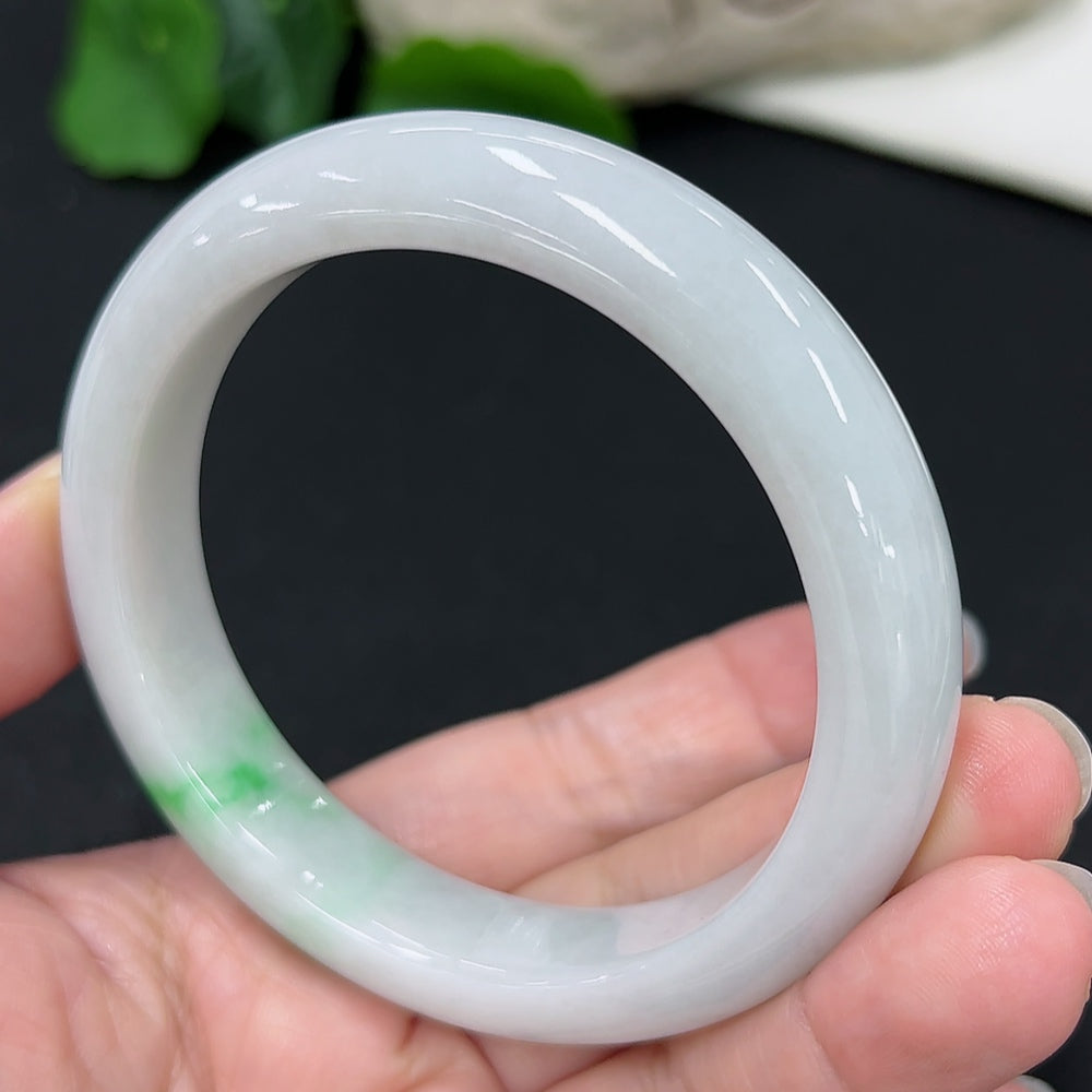 HKHQ jadeite round bangle with size 57.4 and weight 60.67g, showcasing smooth, polished jadeite surface and elegant design.