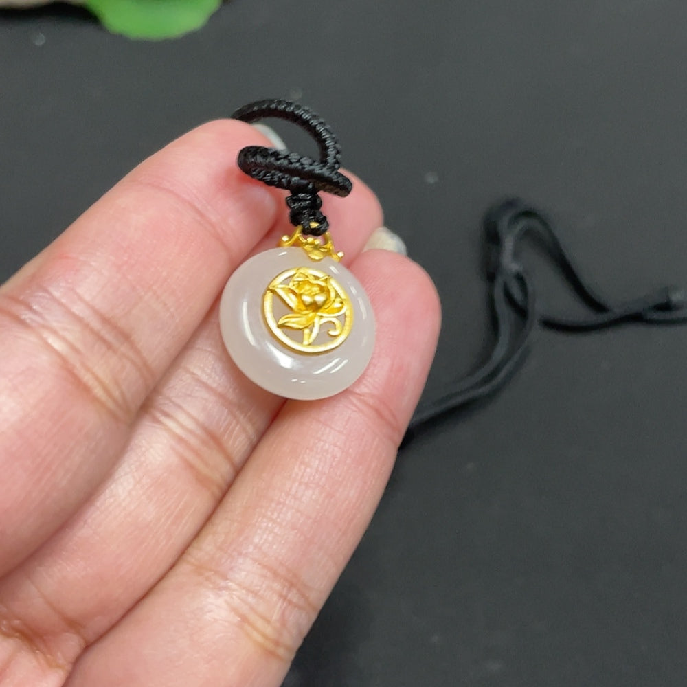 Huiliu HQ Hetian Jade Inlaid Pendant with peace buckle, oval-shaped jade jewelry featuring intricate craftsmanship and natural green hue.