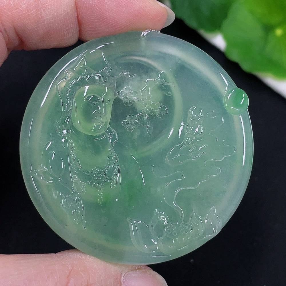 Huiliu Jadeite Guanyin pendant featuring detailed carved figure, crafted from green jade, with Huiliu certification.