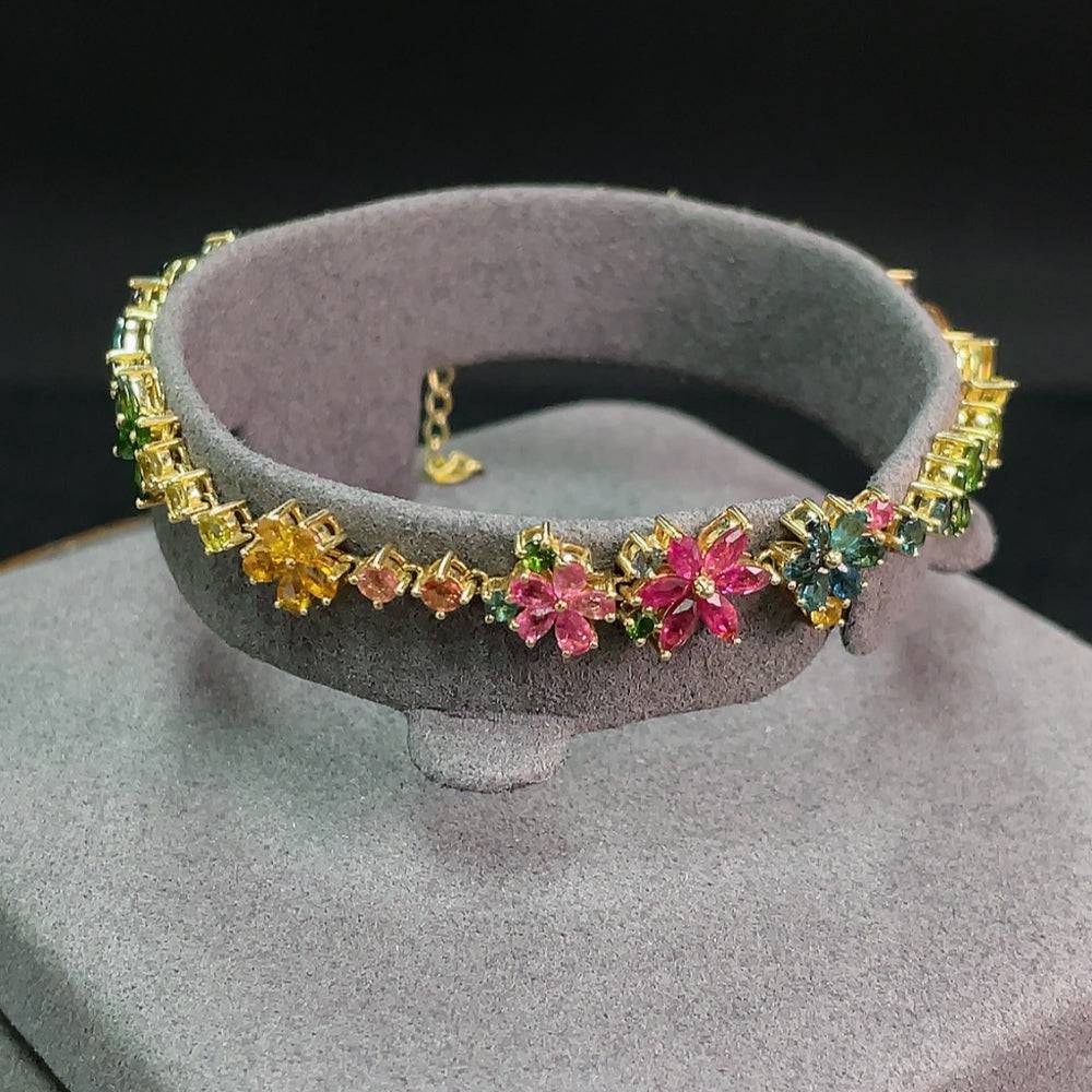Huiliu certified tourmaline gemstone bracelet featuring vibrant, multicolored stones on a delicate bracelet chain.