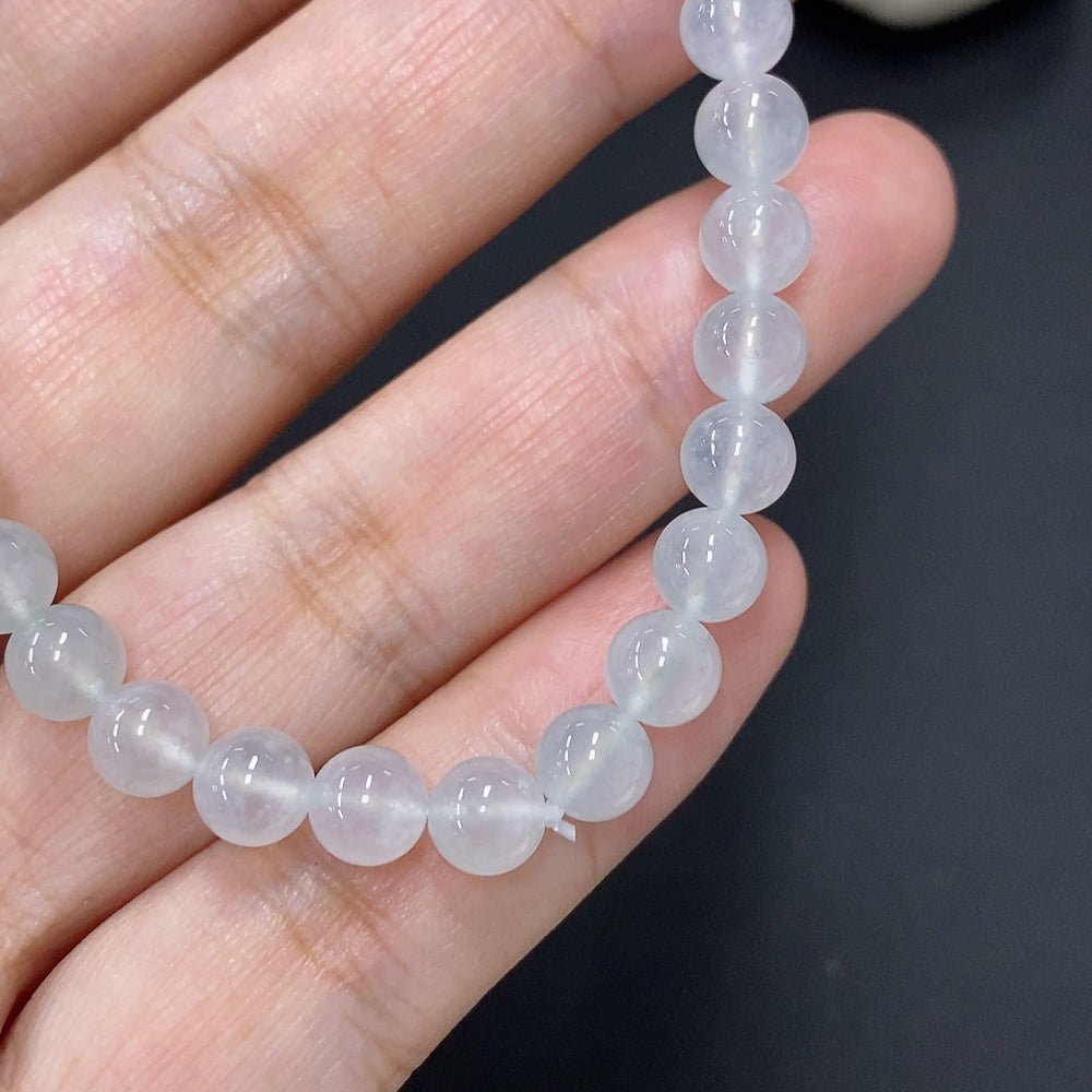 Jadeite bead necklace with 5.8mm jade beads, weighing approximately 11.6g, crafted by HUILIU HQ, shown against a neutral background.