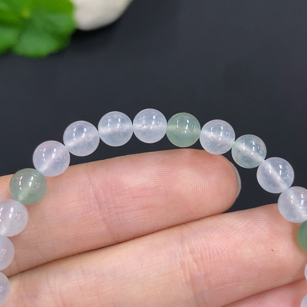 HUILIU HQ jadeite bracelet weighing 11.4g with 5.9mm diameter, showcasing smooth green jade beads on a string.