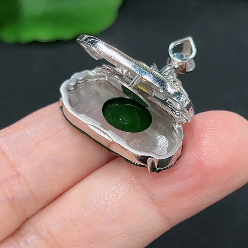 Jadeite pendant with 18K gold setting and diamond accents, elegant necklace featuring a polished jadeite gemstone.