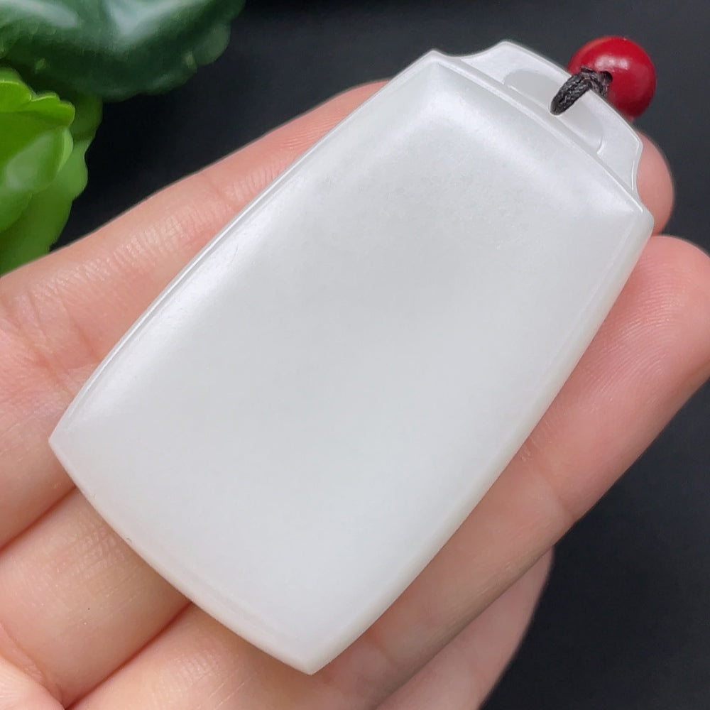 Hetian jade plain pendant with rope necklace, 39.3g, showcasing smooth, polished jade stone on a simple rope chain.