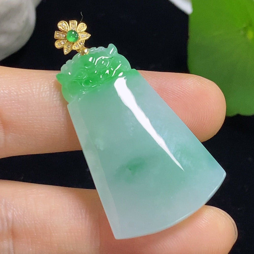 Jadeite Pi Xiu pendant with 18K gold accents and diamond details, showcasing intricate craftsmanship and vibrant green jade.